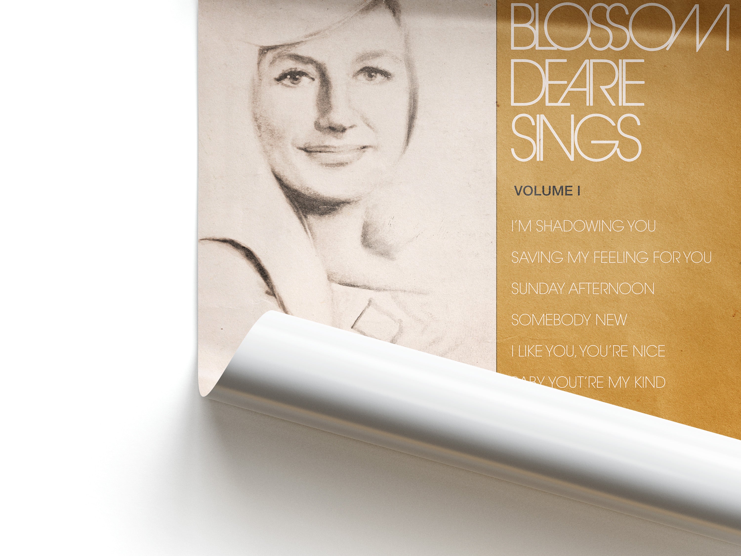 Album cover with a portrait of a woman and text on a beige background with a gold banner.