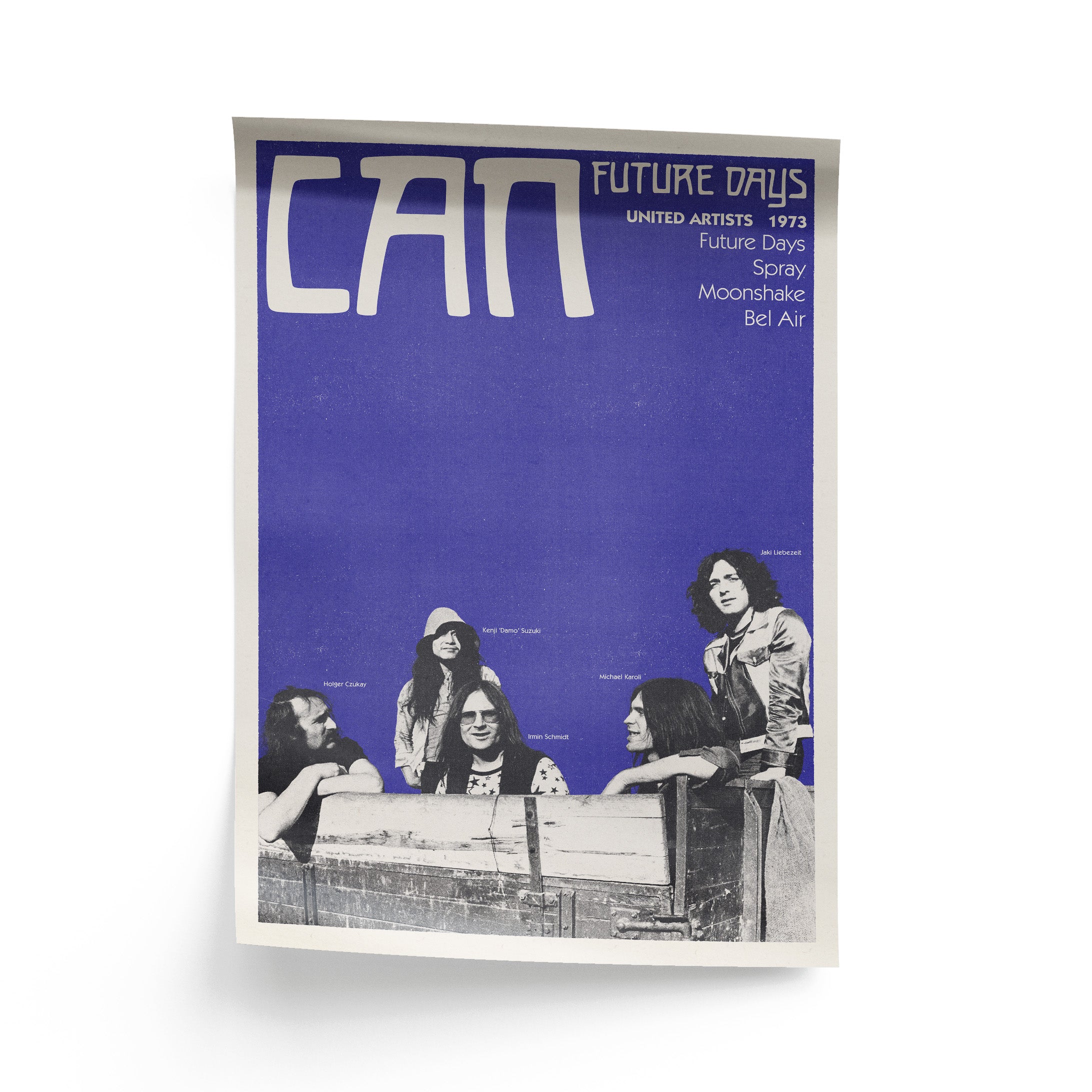 Album cover with black and white photo of band members and 'Can' text on a blue background