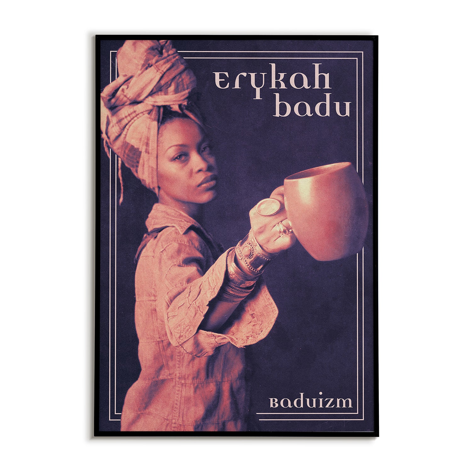 Poster of Erykah Badu holding a cup with 'Erykah Badu' and 'Baduizm' text.