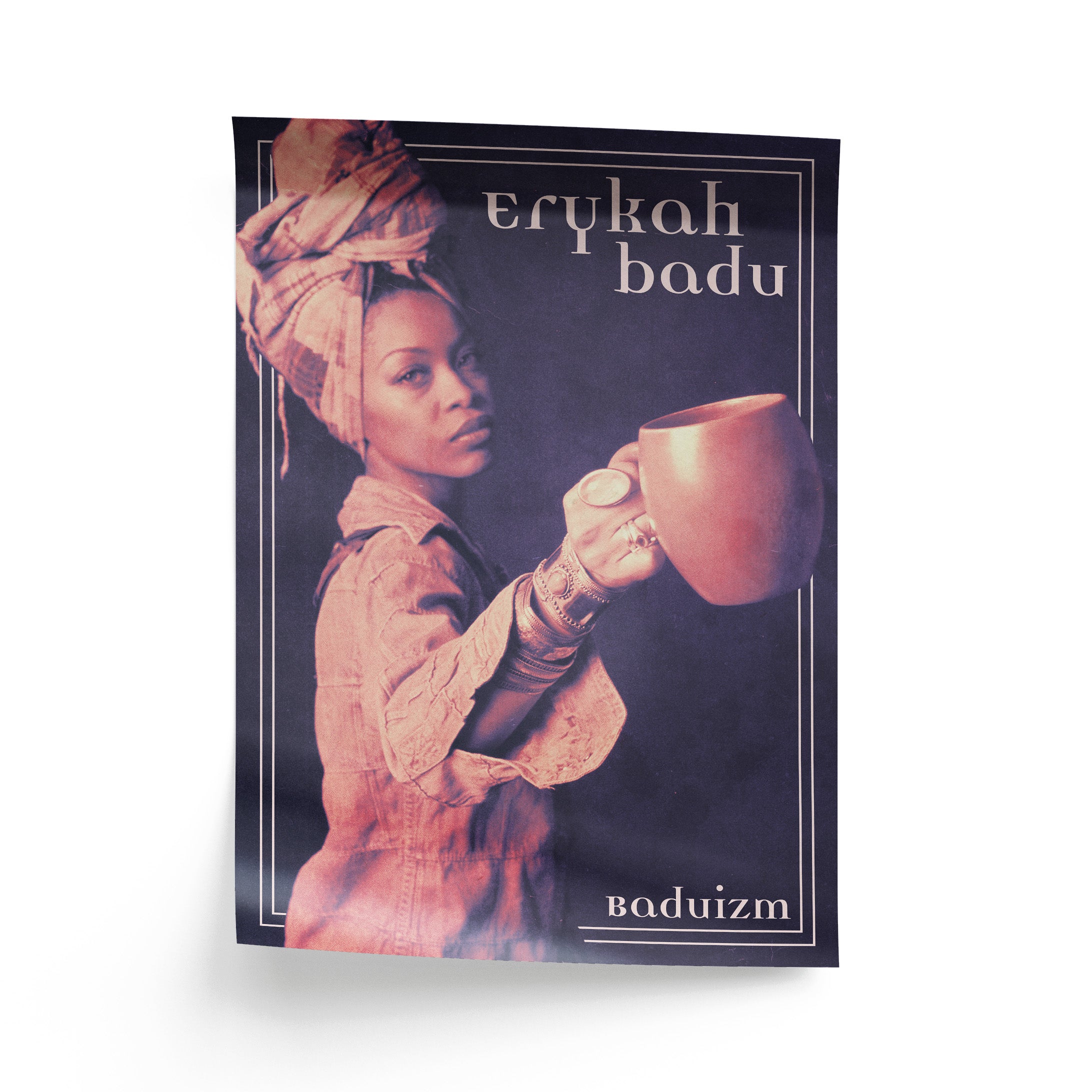 Poster of Erykah Badu holding a coffee cup with text reading "Erykah Badu Baduizm" and a simple border.