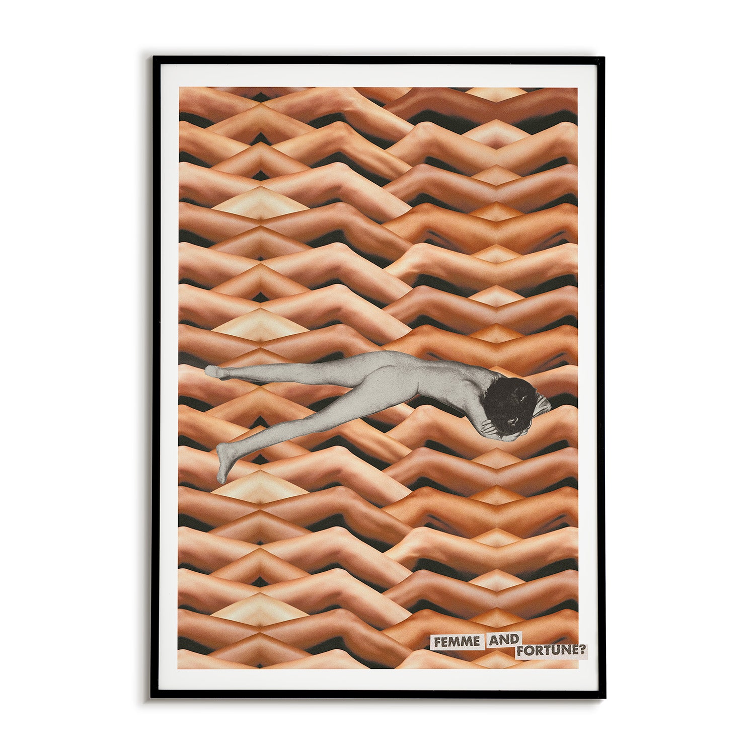 Framed artwork of a nude person laying face down over a patterned background of womens legs with magazine clippings that read 'Femme and Fortune?'