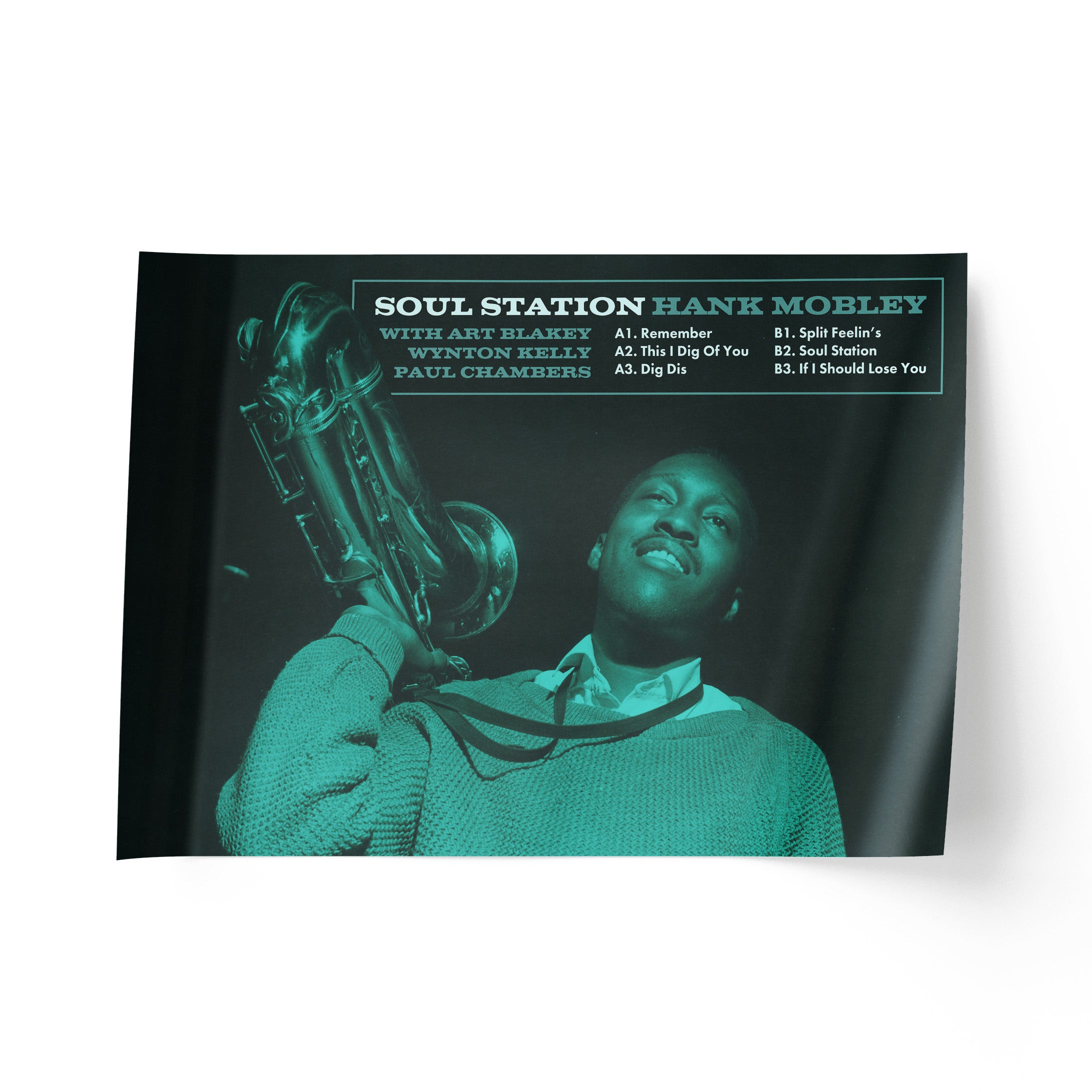 Album cover featuring a musician holding a saxophone with text on a black background