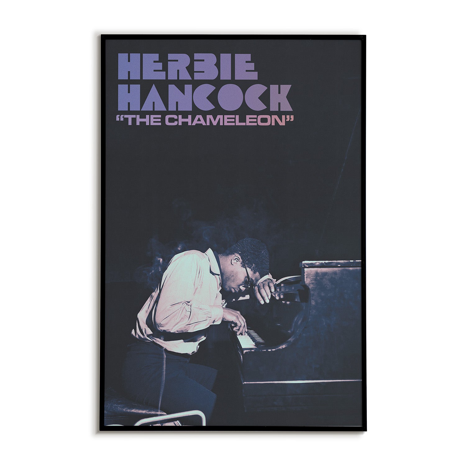 Art print of Herbie Hancock sitting at a piano with his head down. Overhead text read "Herbie Hancock "The Chameleon"