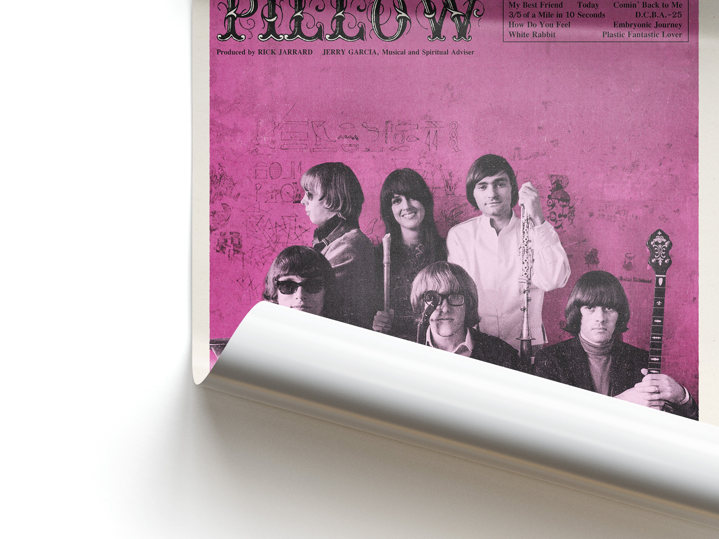 Jefferson Airplane poster with a pink background featuring a band portrait.
