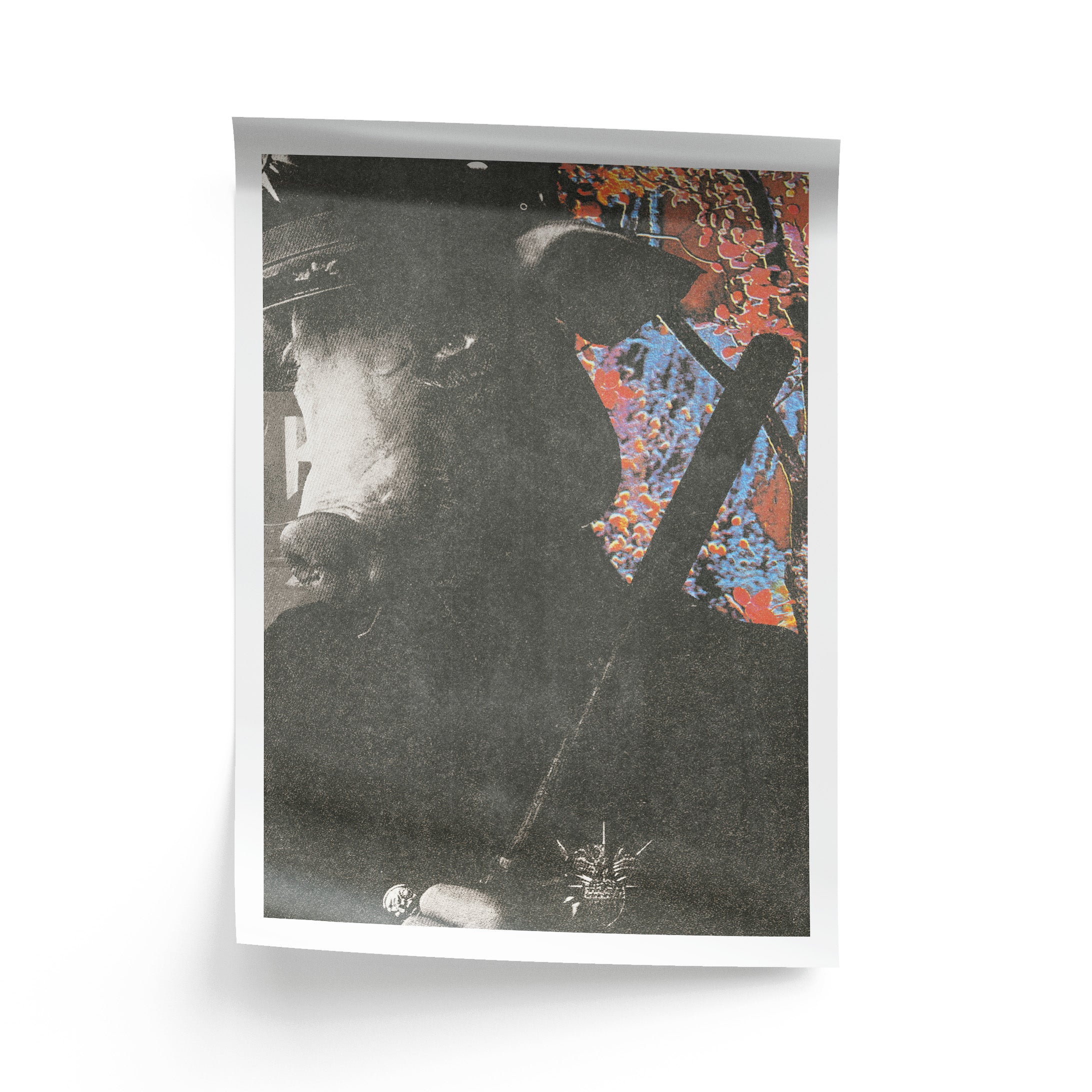 Framed artwork with a black and white portrait and colorful abstract elements.