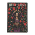 Magazine cover with a woman surrounded by red flowers and 'sade love deluxe' branding.