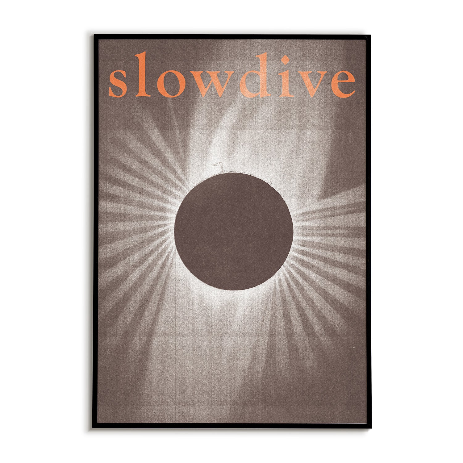Album cover with 'slowdive' text and sunburst design