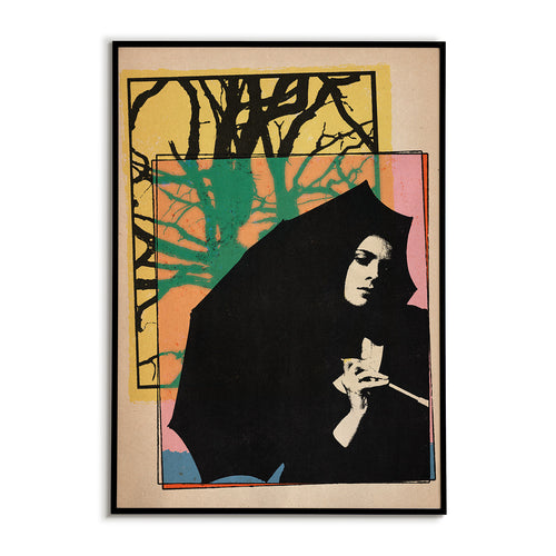 Framed artwork of a silhouette holding an umbrella with colorful abstract background