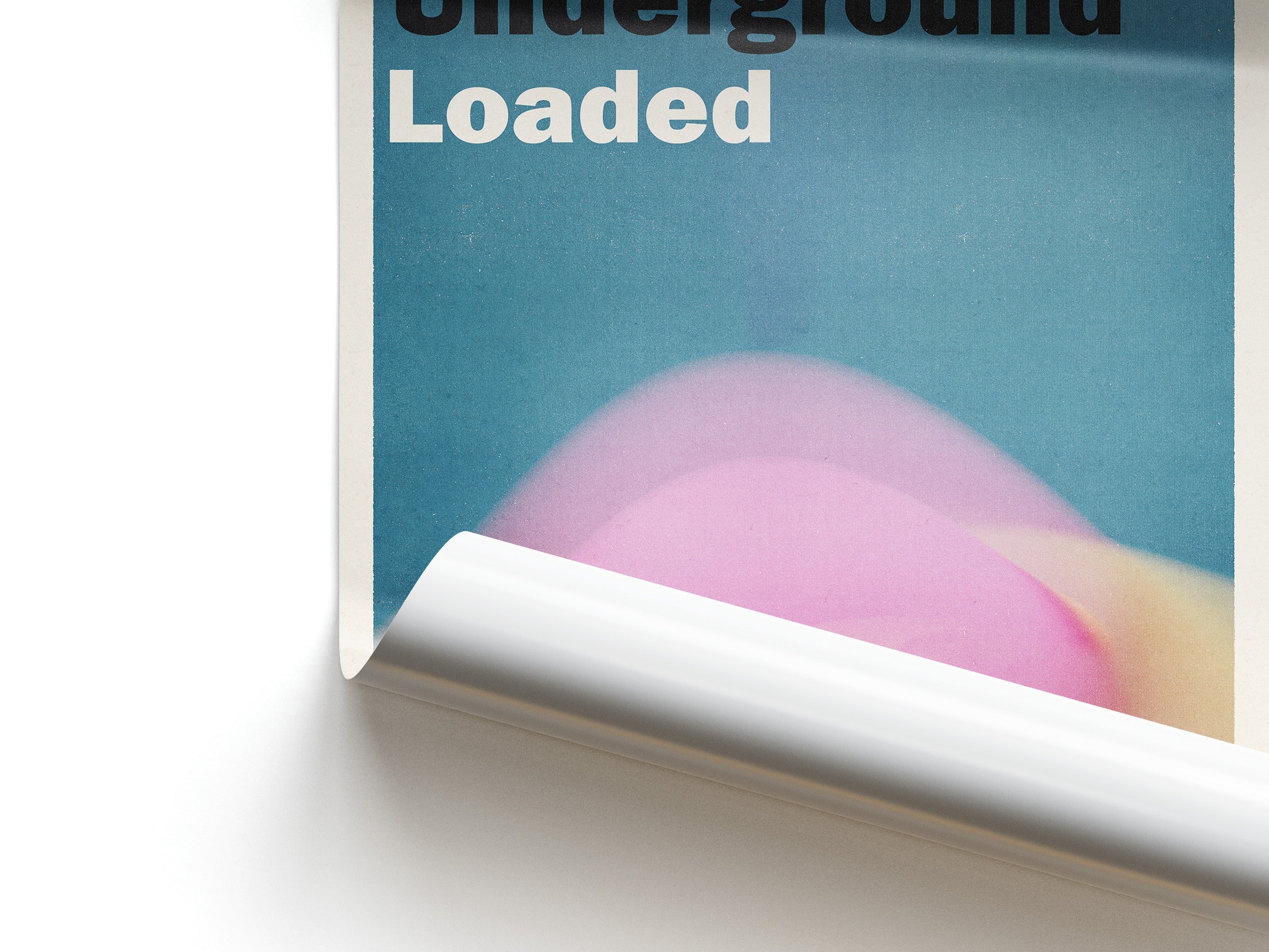 Art print with 'Underground Loaded' text and a pink and blue abstract design.