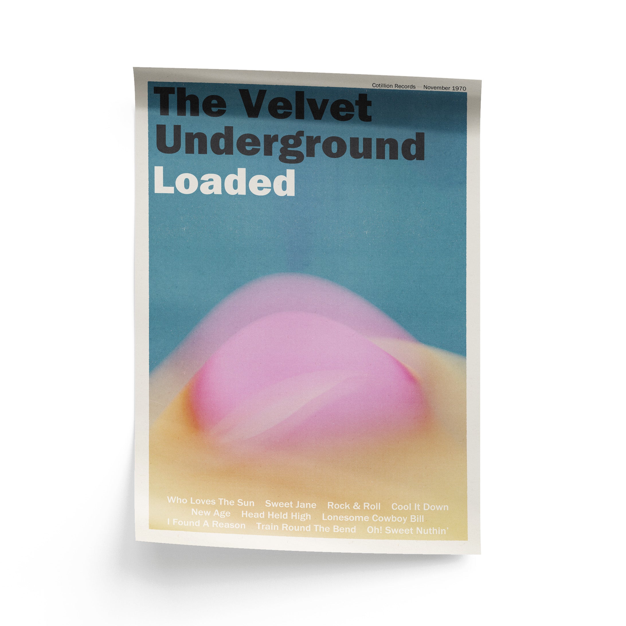 Album cover of 'The Velvet Underground Loaded' with a blurred pink object on a blue background.