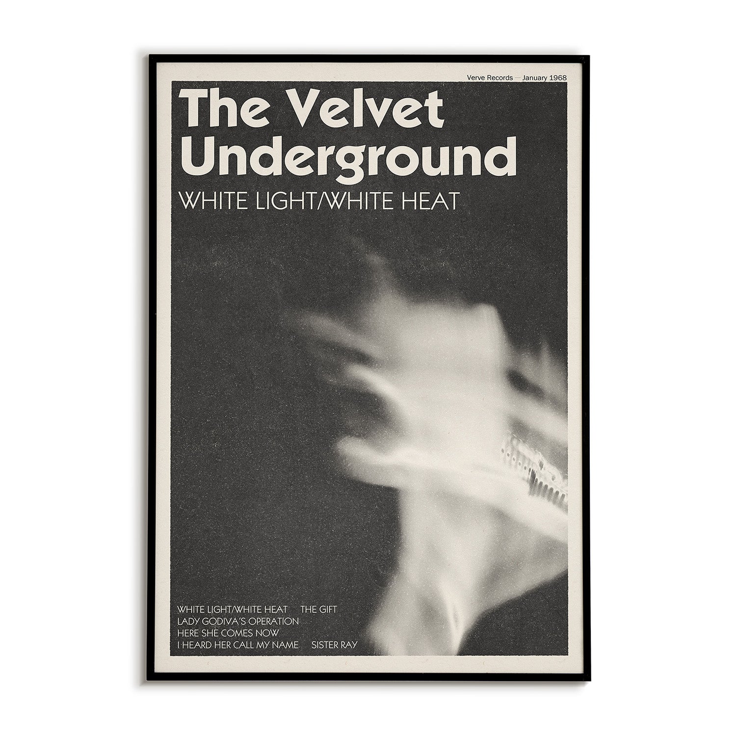 Poster of 'The Velvet Underground' album cover with a blurred image of a person playing guitar.